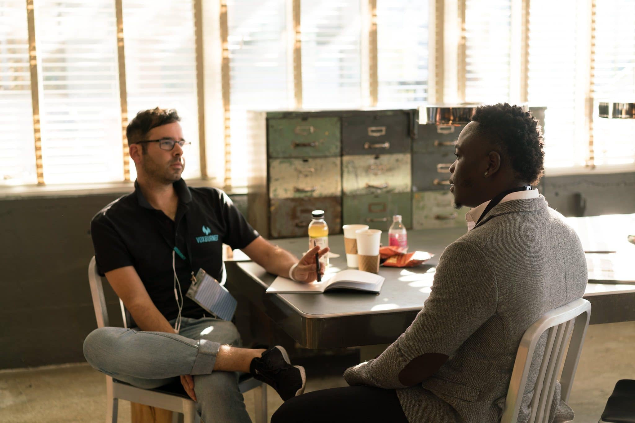 Building Pride Mentoring Program Two Men Sitting